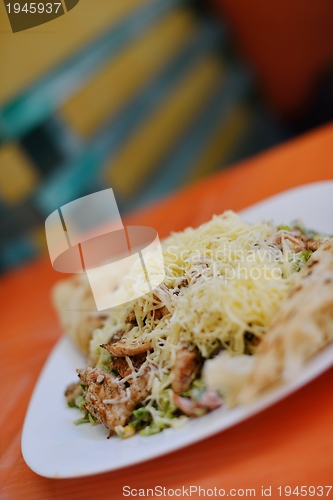 Image of woman eat salad