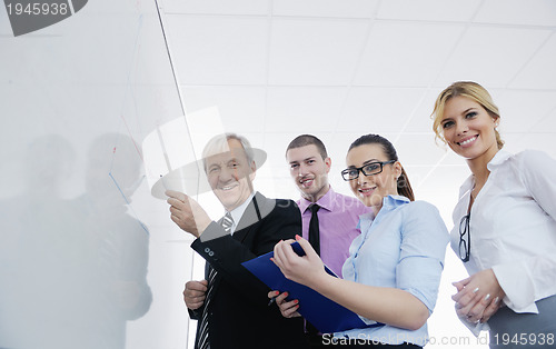 Image of Senior business man giving a presentation