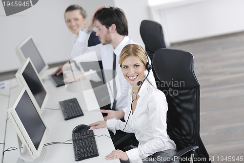 Image of business people group working in customer and help desk office