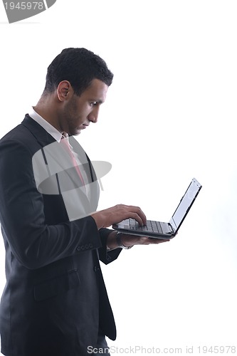 Image of business man work on mini laptop