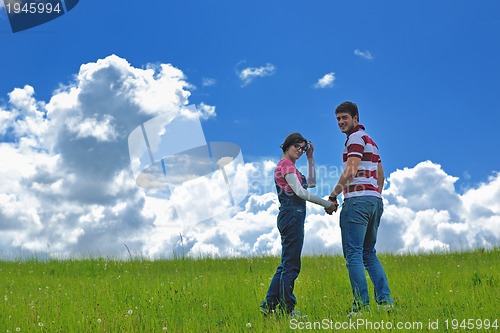 Image of romantic young couple in love together outdoor