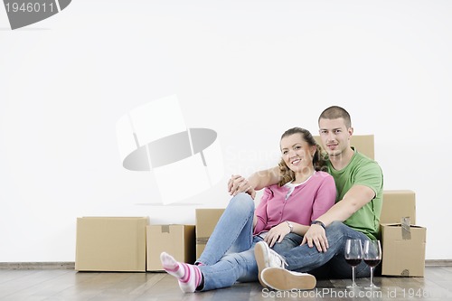 Image of Young couple moving in new home