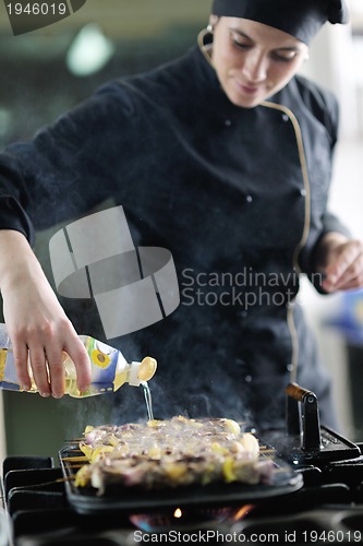 Image of chef preparing meal