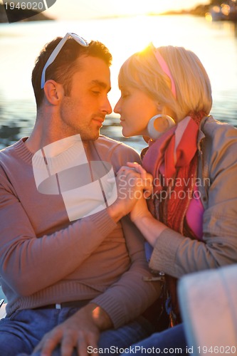 Image of couple in love  have romantic time on boat