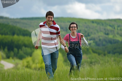 Image of romantic young couple in love together outdoor
