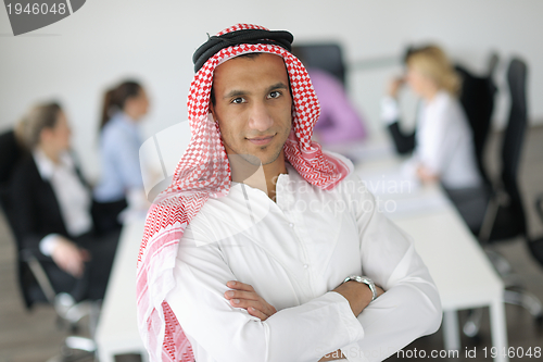 Image of Arabic business man at meeting
