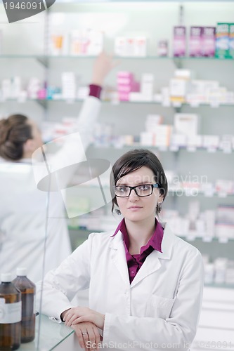 Image of team of pharmacist chemist woman  in pharmacy drugstore