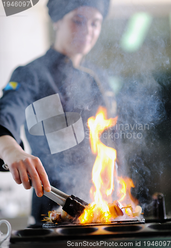 Image of chef preparing meal