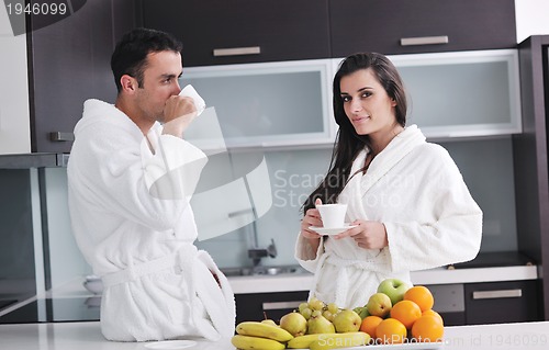 Image of young couple have fun in modern kitchen