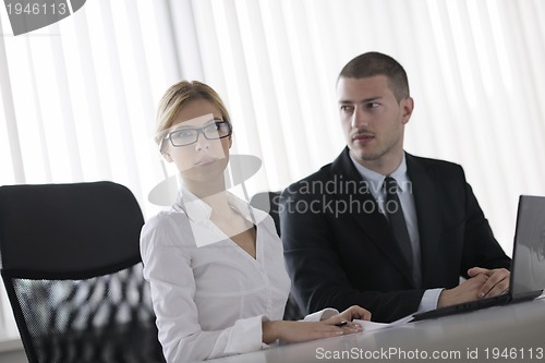 Image of business people in a meeting at office
