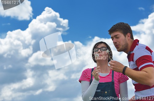 Image of romantic young couple in love together outdoor