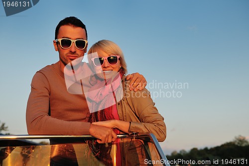 Image of couple in love  have romantic time on boat