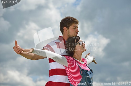 Image of romantic young couple in love together outdoor