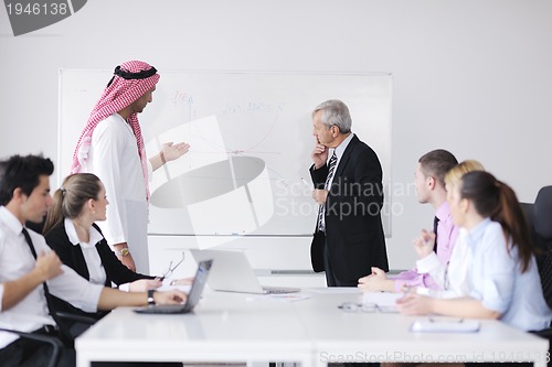 Image of Arabic business man at meeting