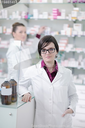 Image of team of pharmacist chemist woman  in pharmacy drugstore