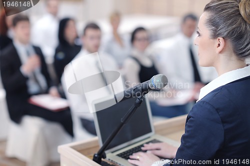 Image of business woman giving presentation