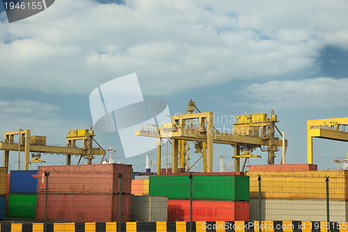 Image of container ship leaving the container port terminal