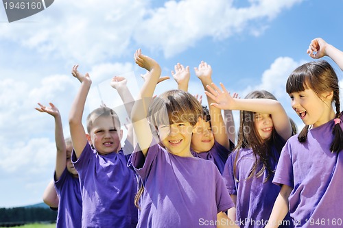 Image of happy kids group  have fun in nature