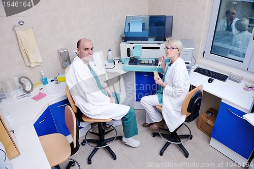 Image of veterinarian and assistant in a small animal clinic