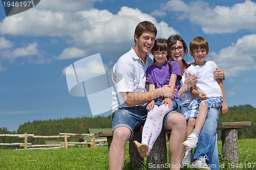 Image of happy young family have fun outdoors