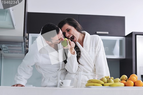 Image of young couple have fun in modern kitchen