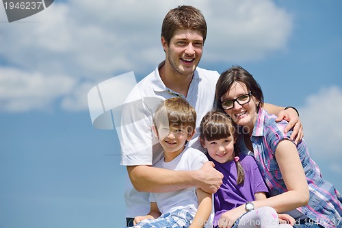 Image of happy young family have fun outdoors