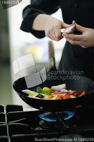 Image of chef preparing meal