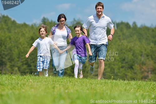 Image of happy young family have fun outdoors