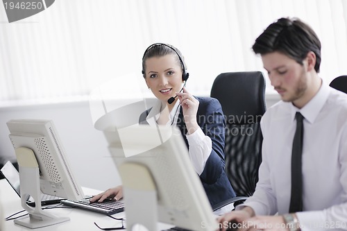 Image of business people group working in customer and help desk office