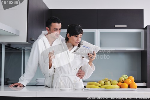Image of young couple have fun in modern kitchen