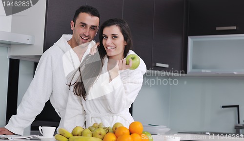 Image of young couple have fun in modern kitchen