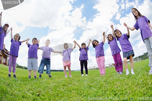 Image of happy kids group  have fun in nature
