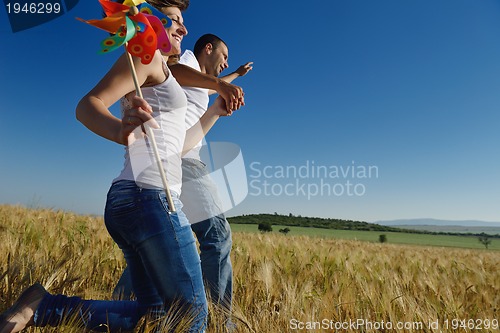 Image of happy couple in wheat field