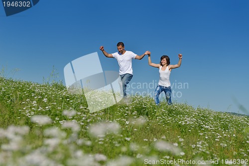 Image of happy couple in wheat field