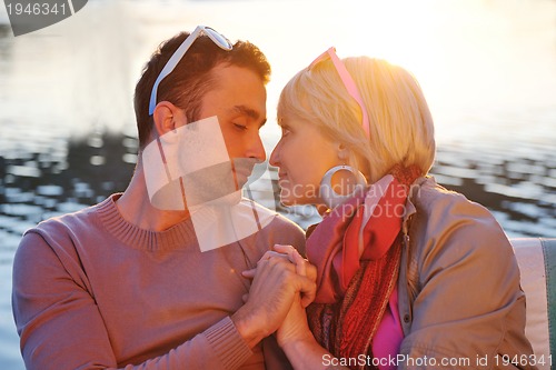 Image of couple in love  have romantic time on boat