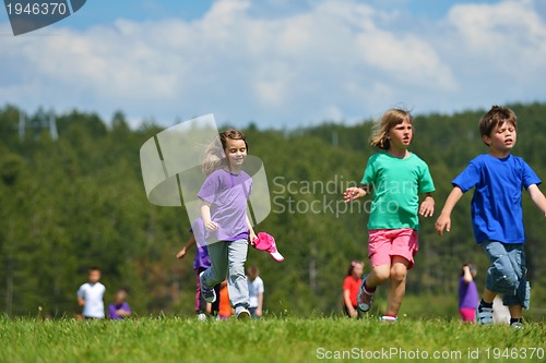 Image of happy kids group  have fun in nature