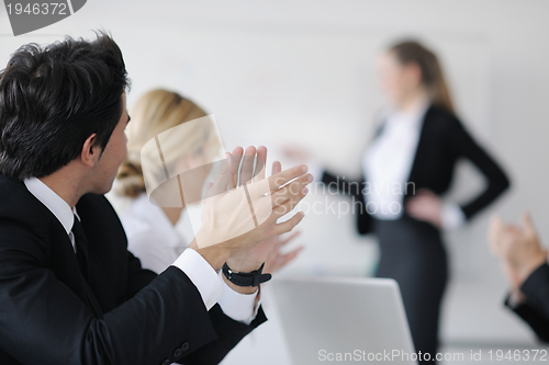 Image of Group of young business people at meeting