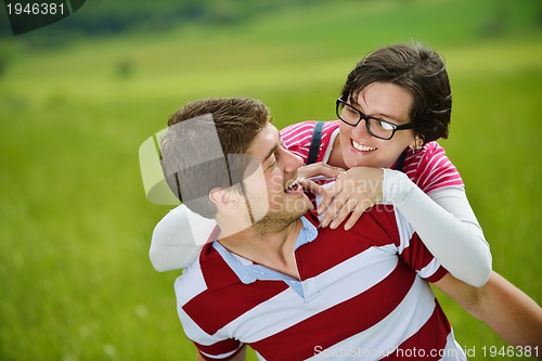 Image of romantic young couple in love together outdoor