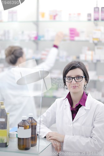 Image of team of pharmacist chemist woman  in pharmacy drugstore