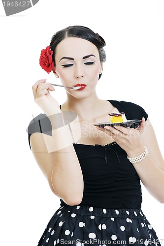 Image of beautiful young woman eat sweet cake