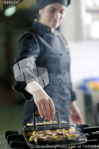 Image of chef preparing meal