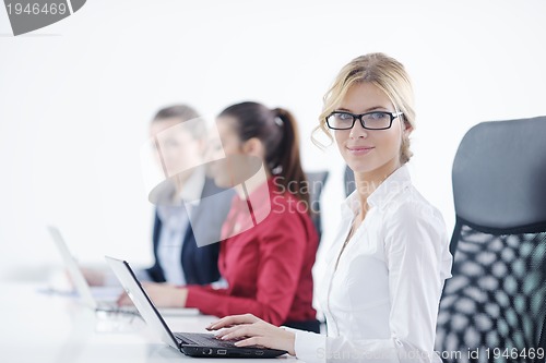 Image of business woman group with headphones