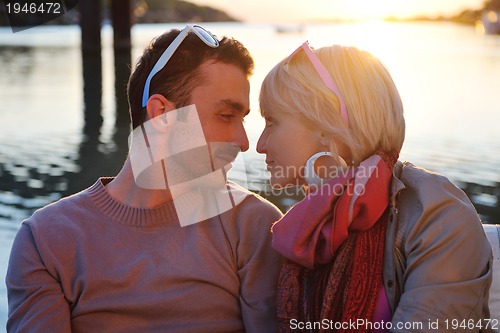 Image of couple in love  have romantic time on boat