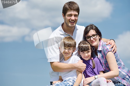 Image of happy young family have fun outdoors