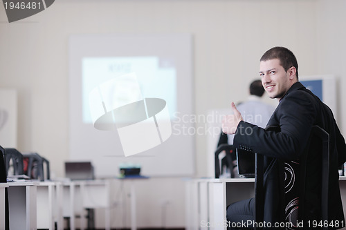 Image of business man on seminar