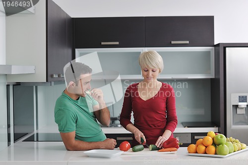 Image of young couple have fun in modern kitchen