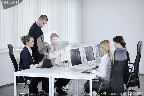 Image of business people group working in customer and help desk office