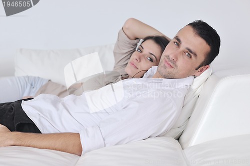 Image of happy young couple relax at home
