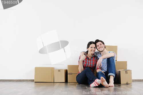 Image of Young couple moving in new house