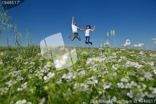 Image of happy couple in wheat field
